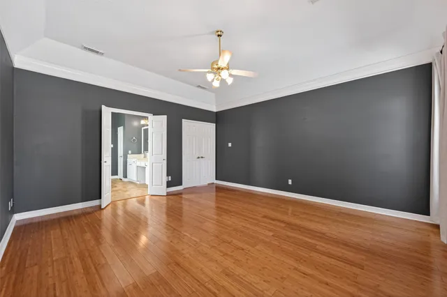 a view of a livingroom with wooden floor