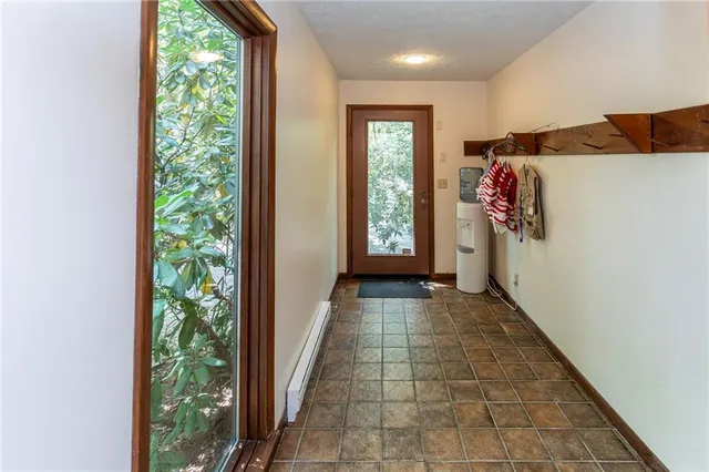 a view of hallway with windows