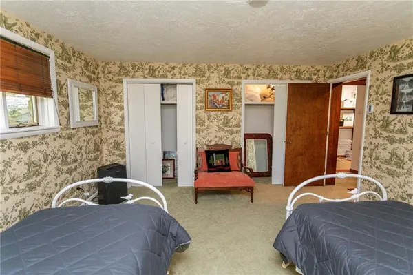 a living room with furniture or couch and a flat screen tv