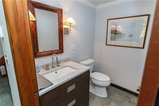 a bed room with a bed and a night stand