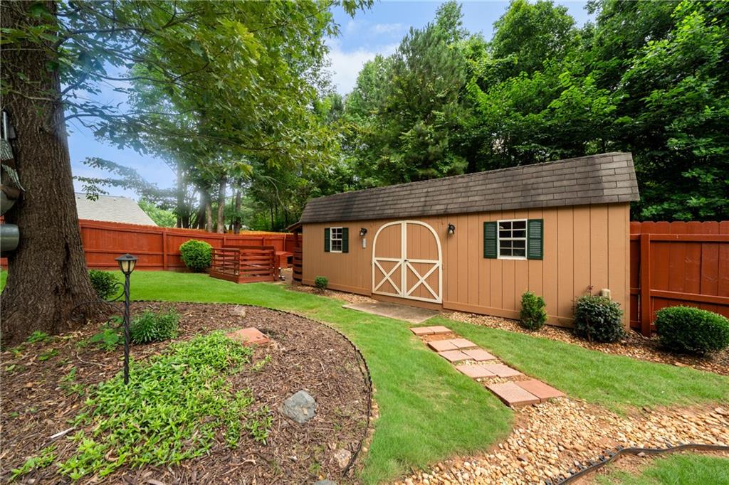 55 Meridian Point Dallas, GA 30132 - Photo 37 of 45 a backyard of a house with wooden fence