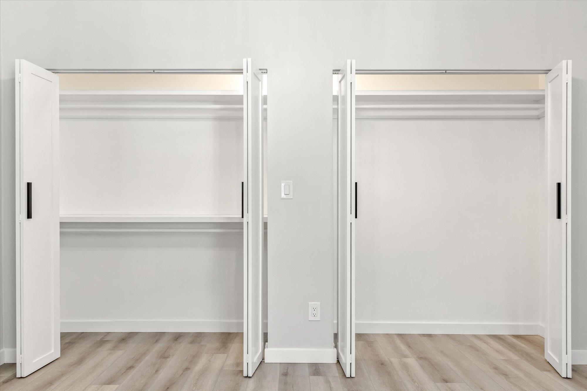 28 Sebastian Avenue, Unit A St. Augustine, FL 32084 - Photo 17 of 26 a view of walk in closet with empty racks