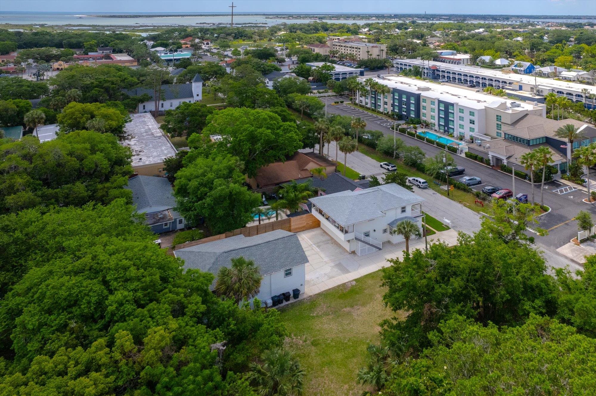 28 Sebastian Avenue, Unit A St. Augustine, FL 32084 - Photo 23 of 26 an aerial view of residential houses with outdoor space and river view