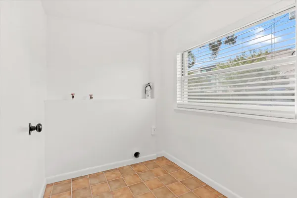 a view of small space with racks on the wall