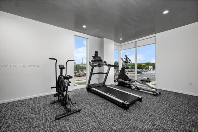 a view of a room with gym equipment