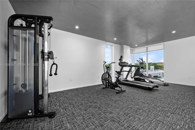 a view of a room with gym equipment