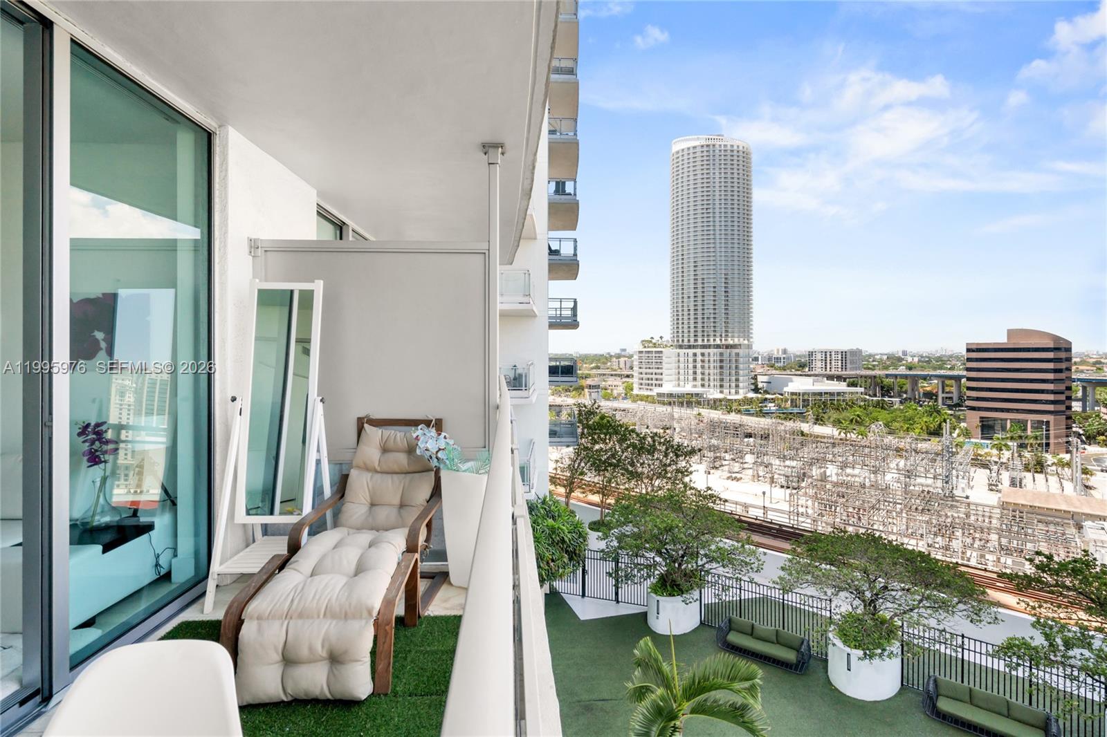 90 Southwest 3rd Street, Unit 1209 Miami, FL 33130 - Photo 33 of 33 a view of balcony with furniture and garden