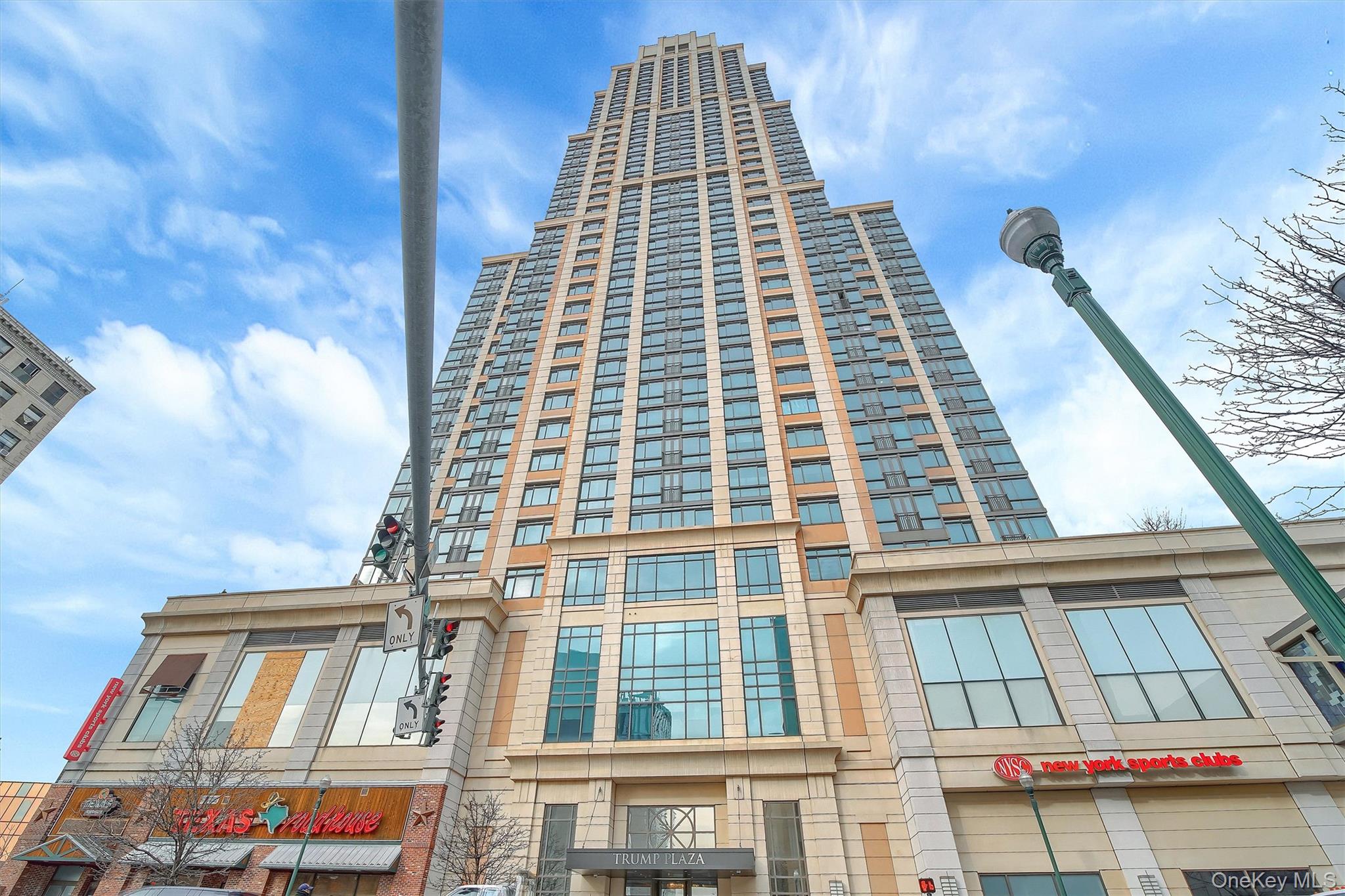 175 Huguenot Street, Unit 2108 New Rochelle, NY 10801 - Photo 2 of 18 front view of a building