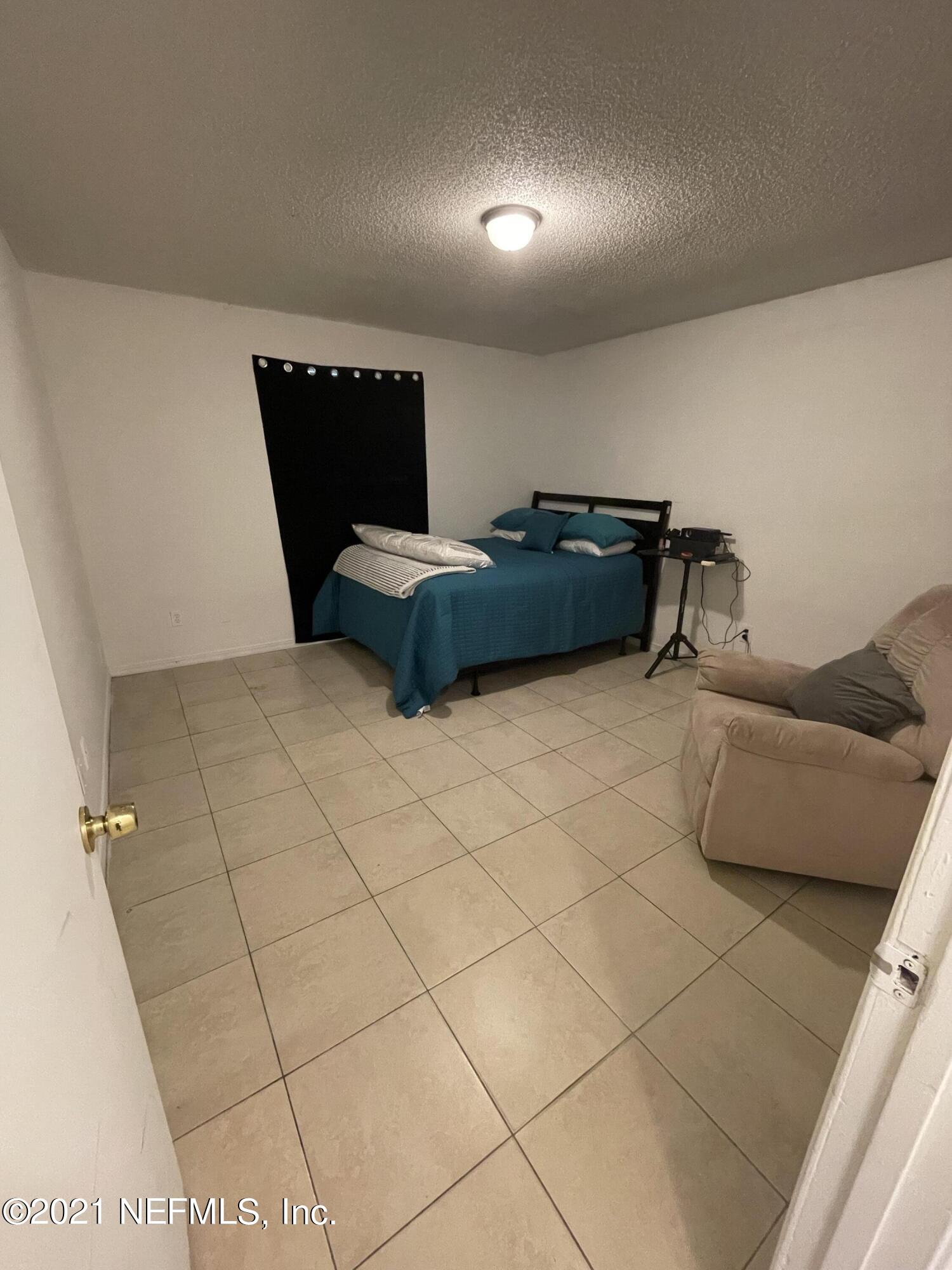 5126 Ricker Road Jacksonville, FL 32210 - Photo 8 of 10 Master Bedroom