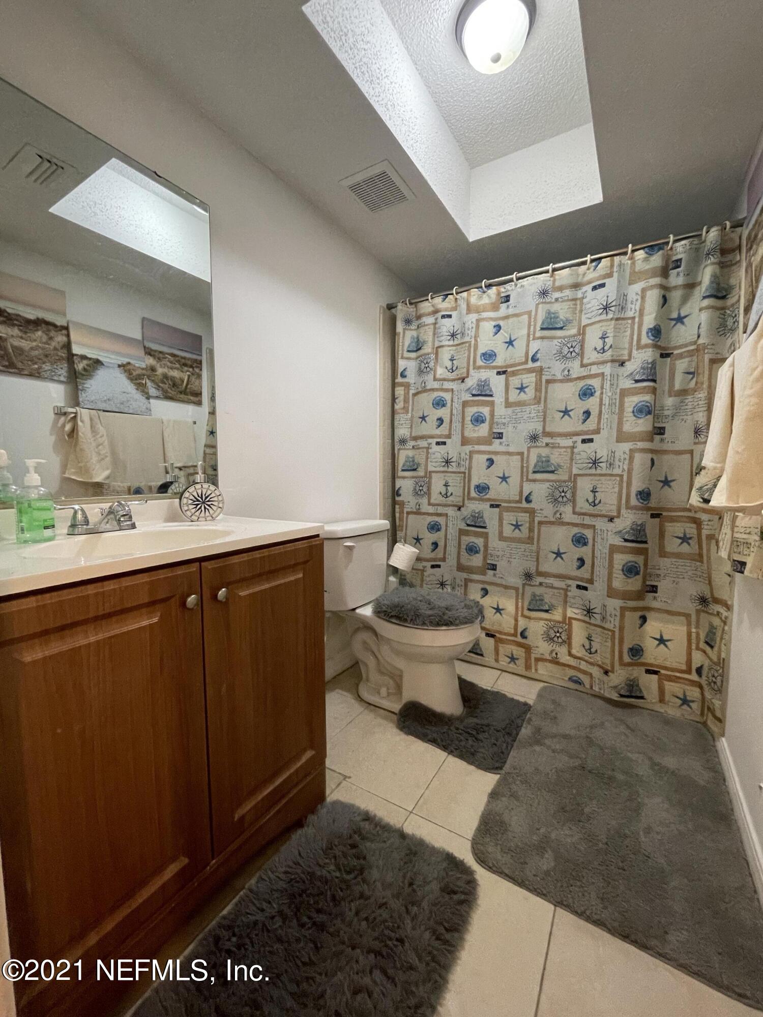 5126 Ricker Road Jacksonville, FL 32210 - Photo 10 of 10 Hall Bathroom