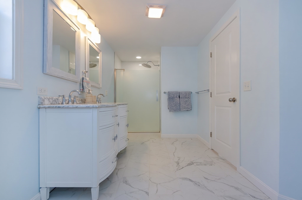 56 Acushnet Road Mattapoisett, MA 02739 - Photo 12 of 23 a bathroom with a sink and a mirror