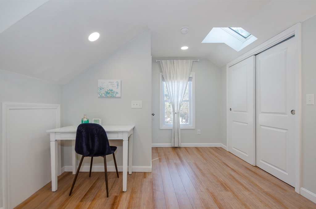 56 Acushnet Road Mattapoisett, MA 02739 - Photo 9 of 23 a workspace with furniture and wooden floor