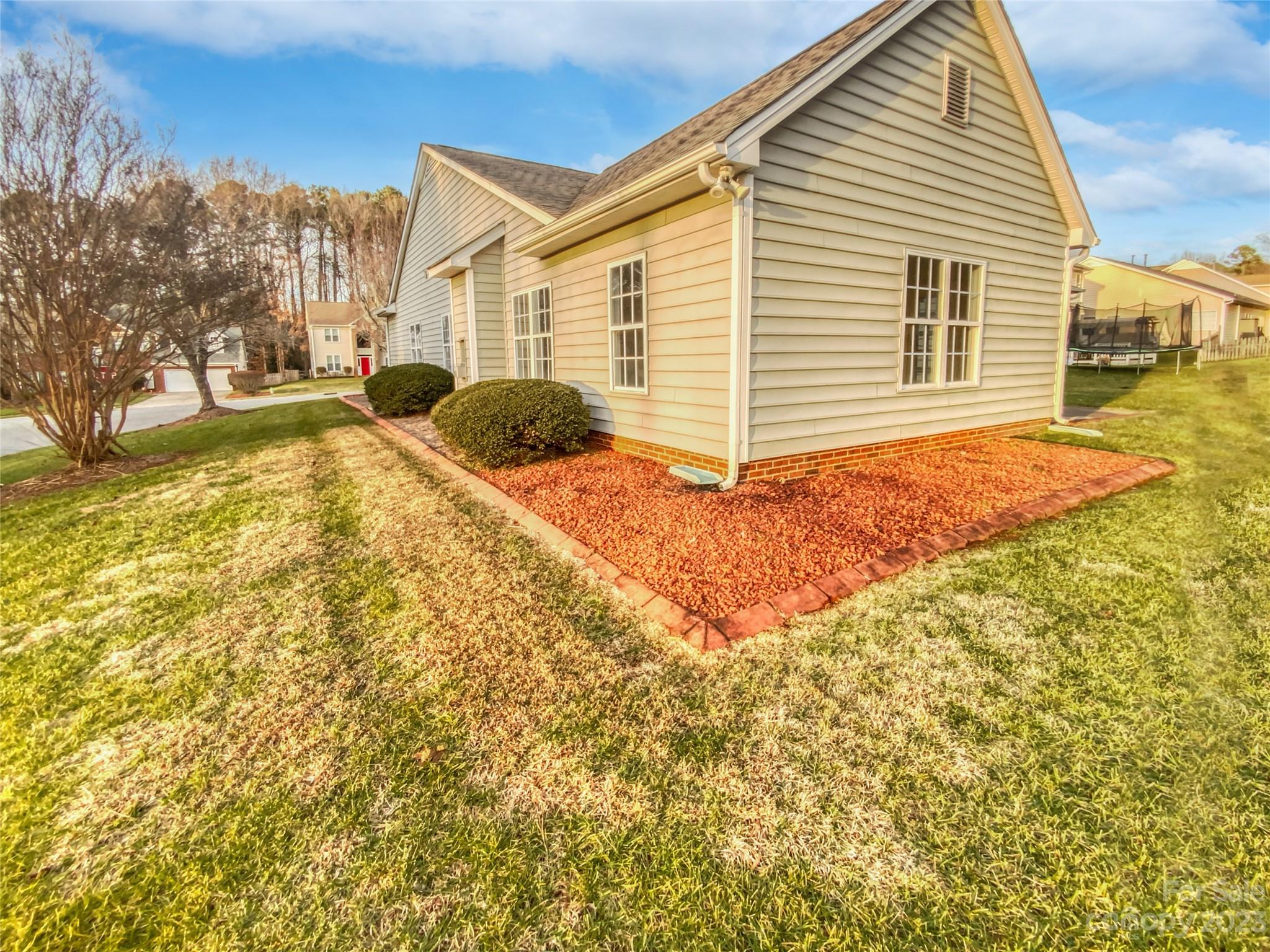 6710 Reedy Creek Road Charlotte, NC 28215 - Photo 7 of 26 a view of a yard in front of a house