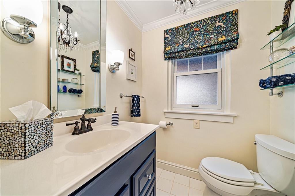 308 Maple Lane Sewickley, PA 15143 - Photo 23 of 40 a bathroom with a sink a toilet and mirror