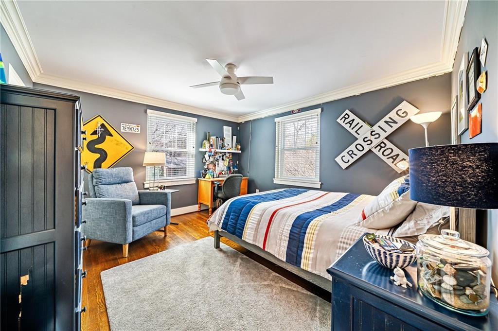 308 Maple Lane Sewickley, PA 15143 - Photo 31 of 40 a bedroom with a bed and wooden floor