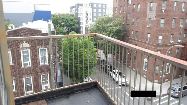 a view of a building from a balcony