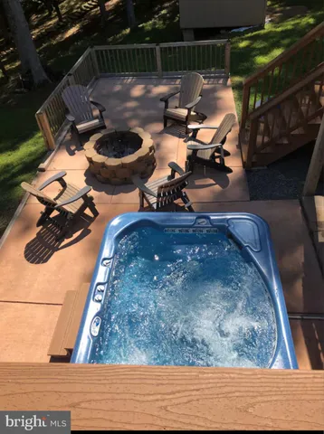 a view of a lake with houses in the back