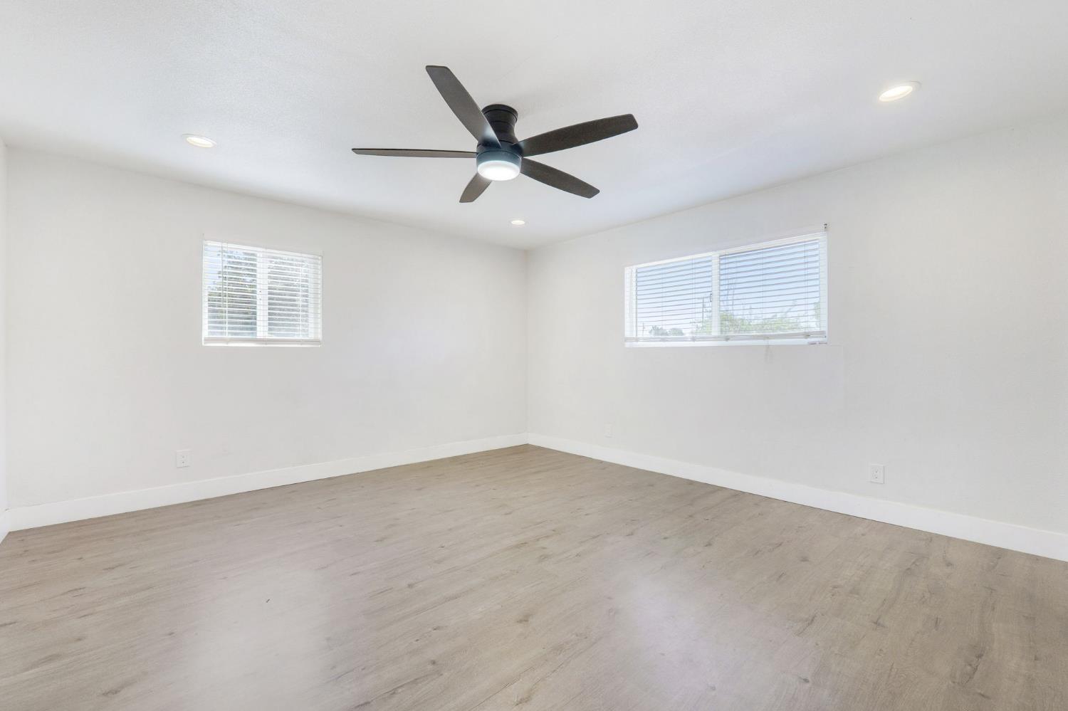 4729 Santa Rosa Avenue Robbins, CA 95676 - Photo 12 of 28 an empty room with a window and a fan