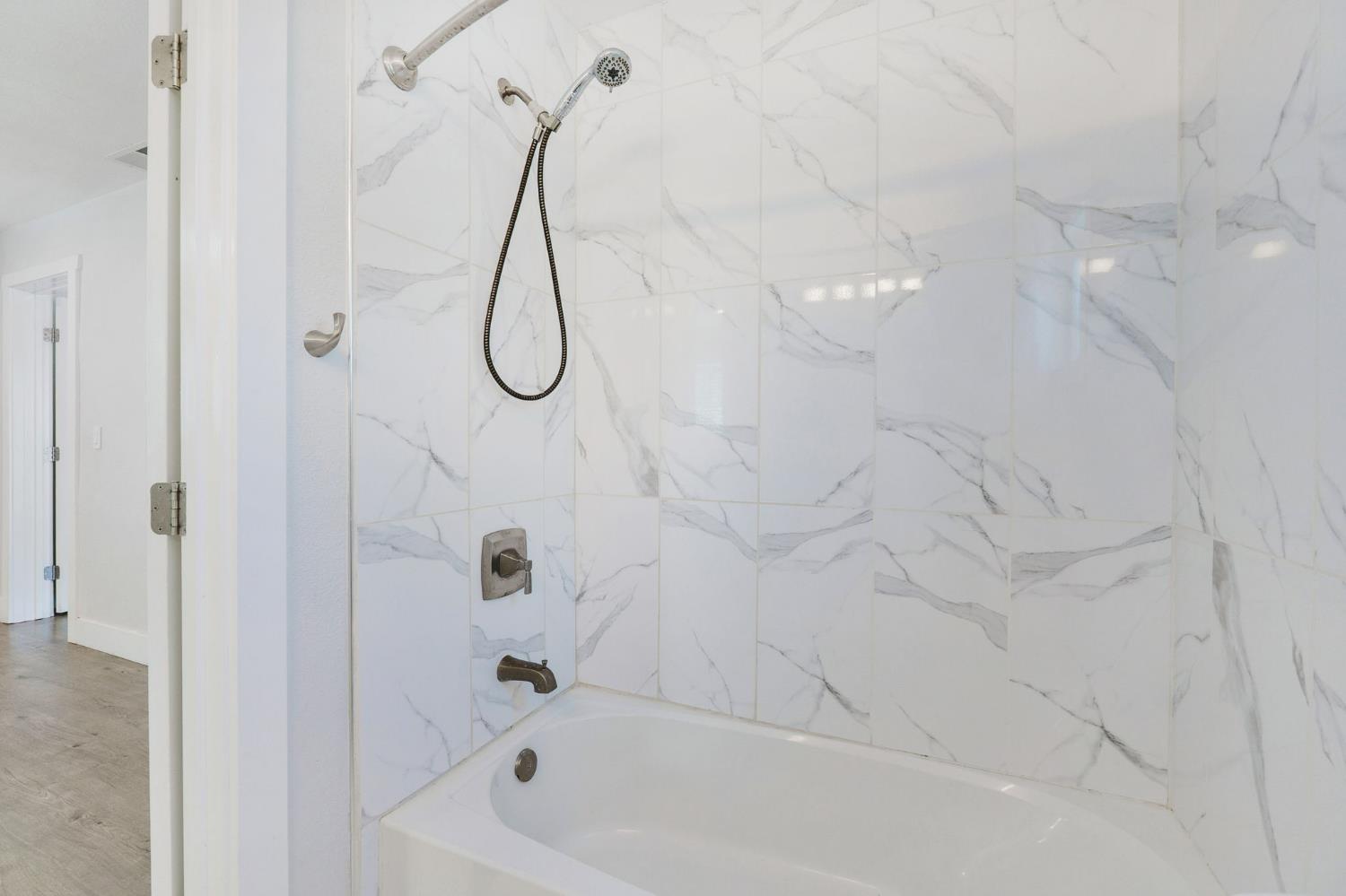 4729 Santa Rosa Avenue Robbins, CA 95676 - Photo 14 of 28 a bathroom with a bath tub with a shower