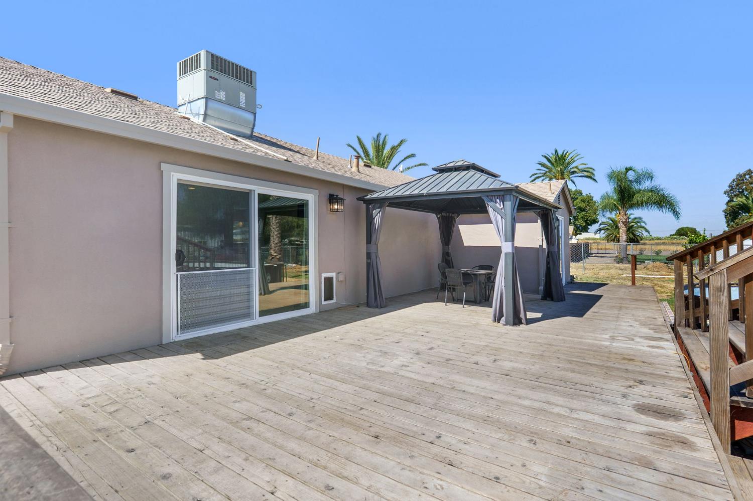 4729 Santa Rosa Avenue Robbins, CA 95676 - Photo 21 of 28 a view of a house with a wooden floor