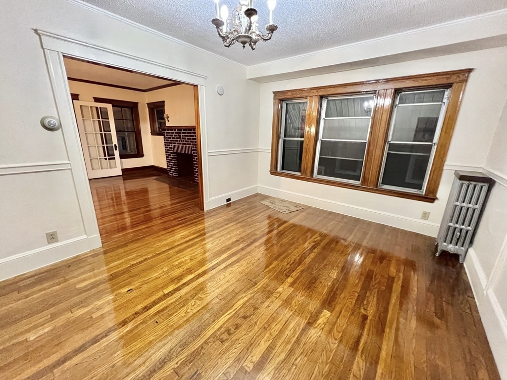 5 City View Road, Unit 2/F Boston, MA 02446 - Photo 1 of 14 a view of a room with wooden floor and staircase