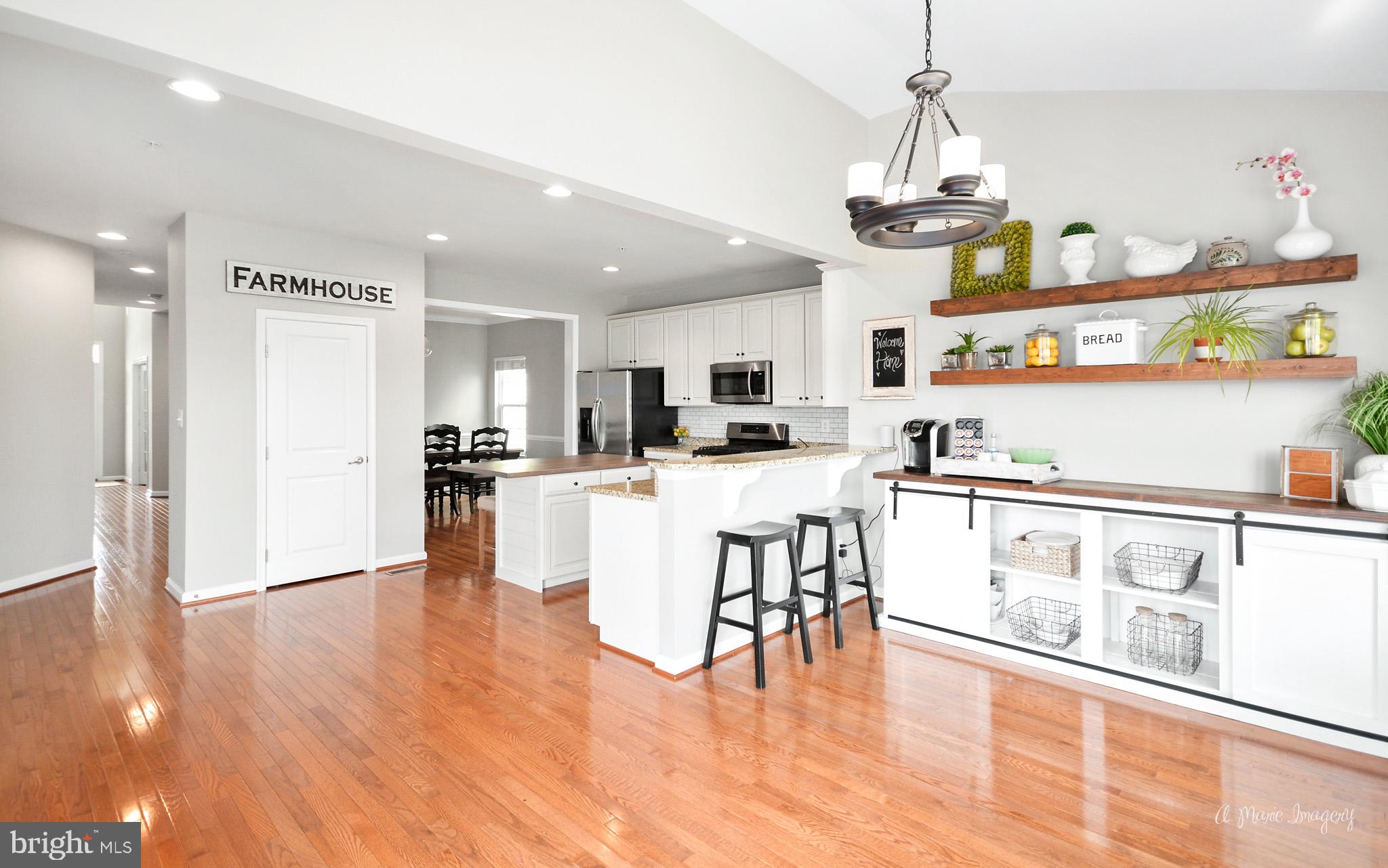 Gourmet Kitchen opens to large morning rm w/views