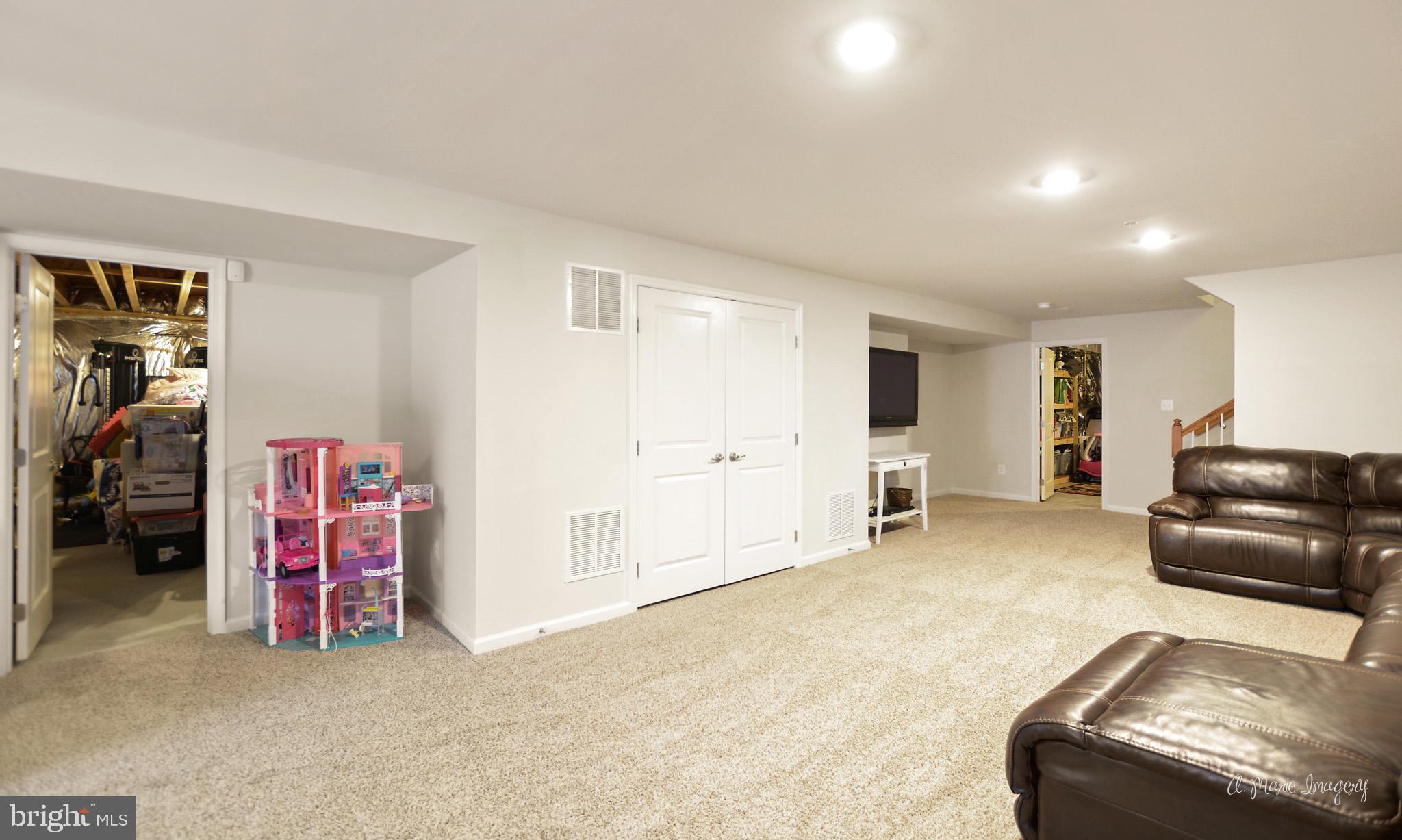 9162 Bealls Farm Road Frederick, MD 21704 - Photo 44 of 68 HUGE finished space opens to 2 large storage space