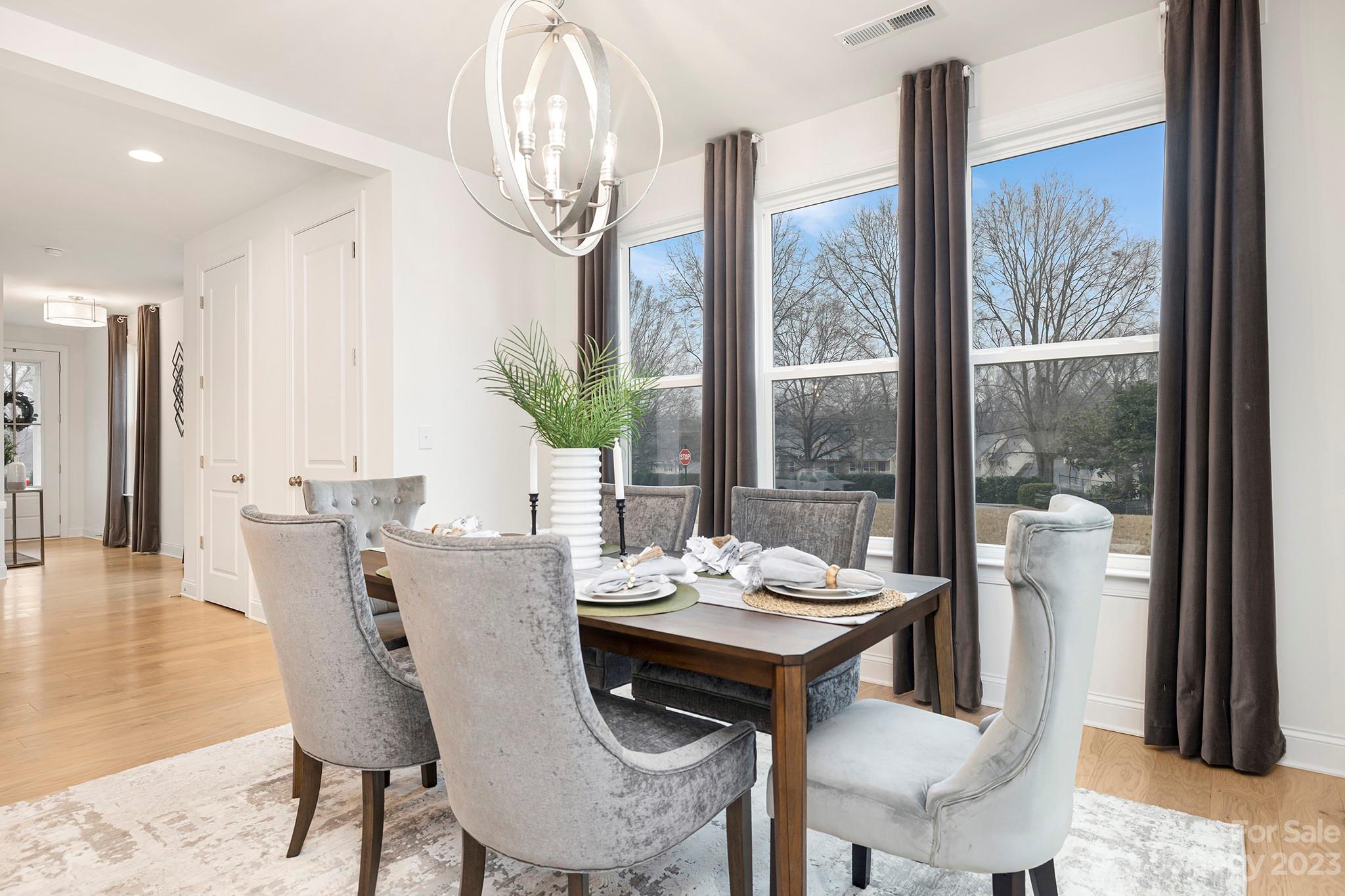 4013 Ashton Ridge Lane Charlotte, NC 28226 - Photo 7 of 13 a view of a dining room with furniture window and outside view