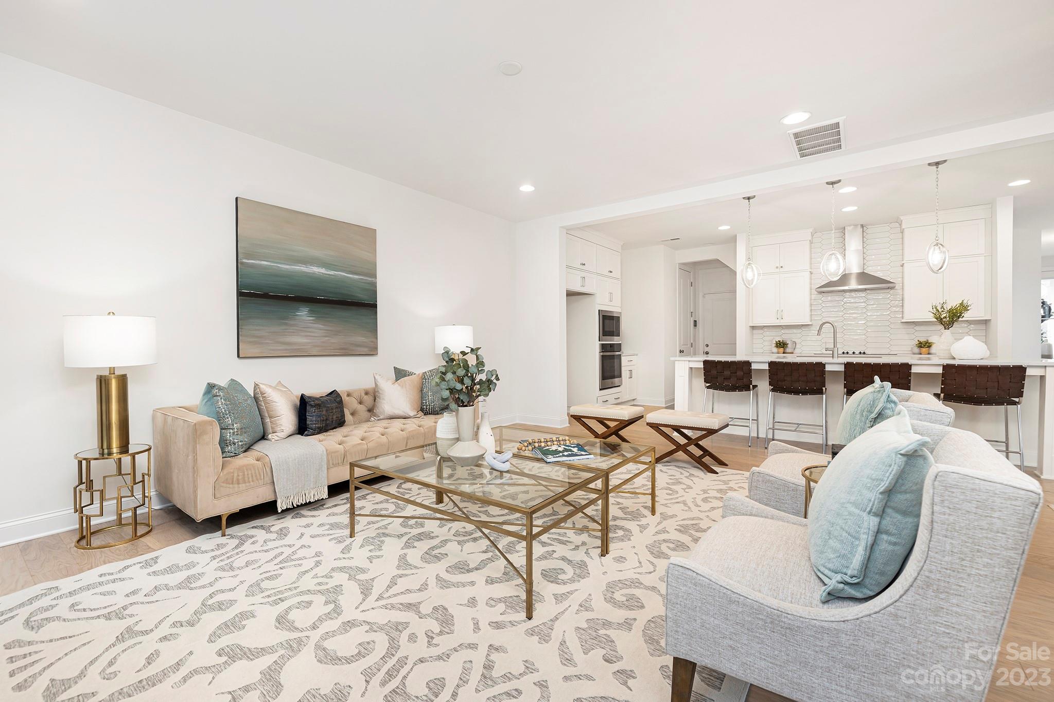 4013 Ashton Ridge Lane Charlotte, NC 28226 - Photo 9 of 13 a living room with furniture and a large window