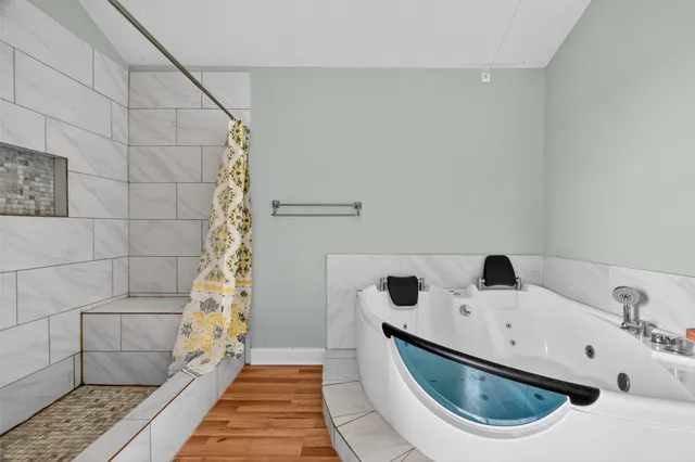 a bathroom with a sink and a shower