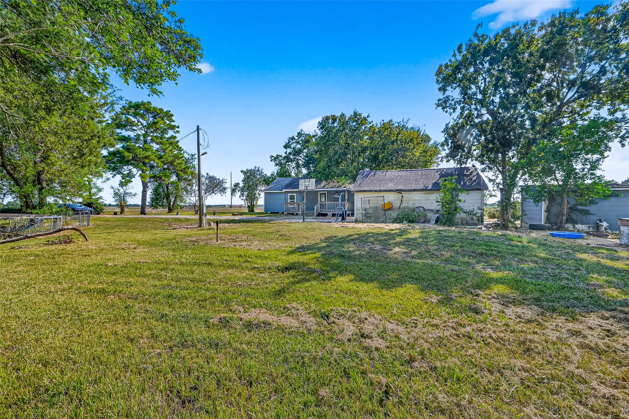 6434 Boothline Road Richmond, TX 77469 - Photo 32 of 36 a swimming pool view with a outdoor seating