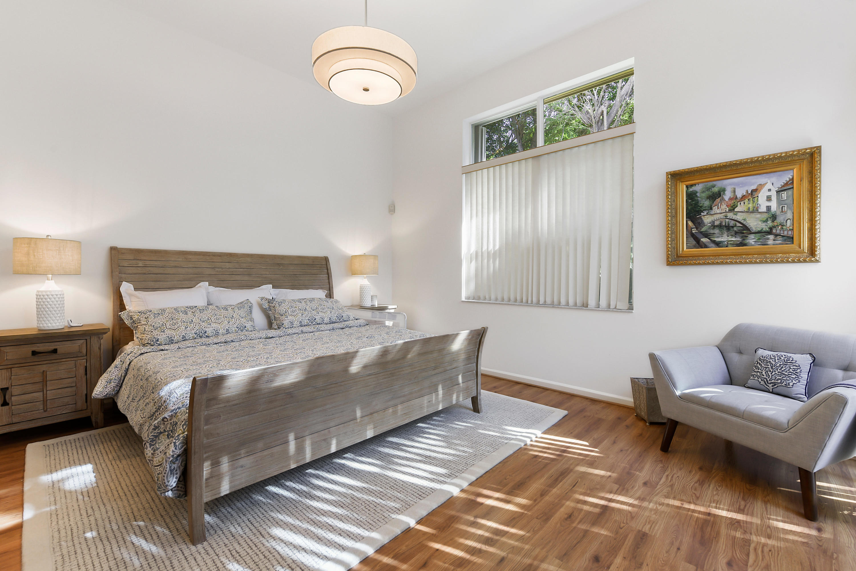 6606 Northwest 23rd Terrace Boca Raton, FL 33496 - Photo 11 of 21 a bedroom with a bed and a couch