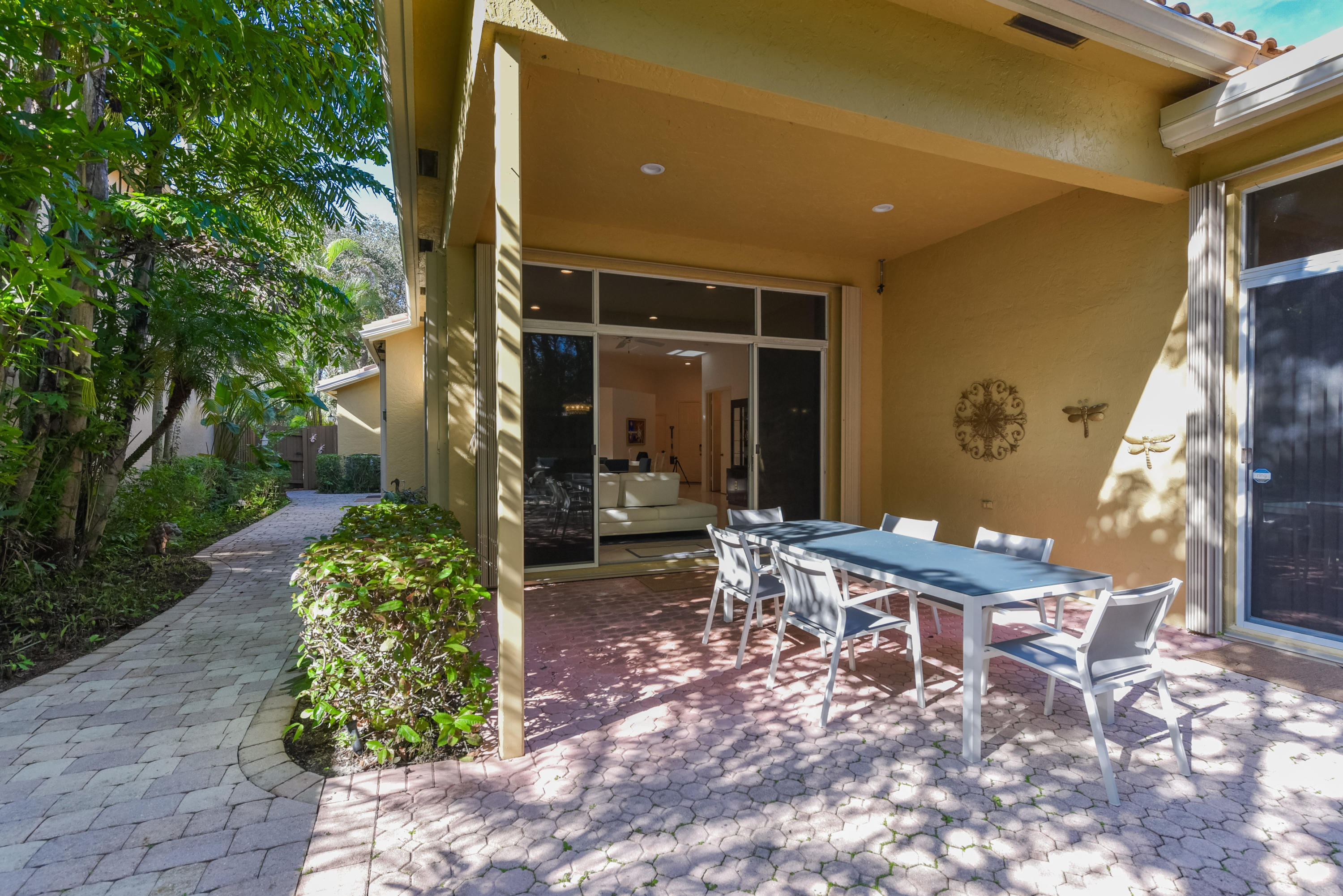 6606 Northwest 23rd Terrace Boca Raton, FL 33496 - Photo 21 of 21 a view of a house with backyard and sitting area