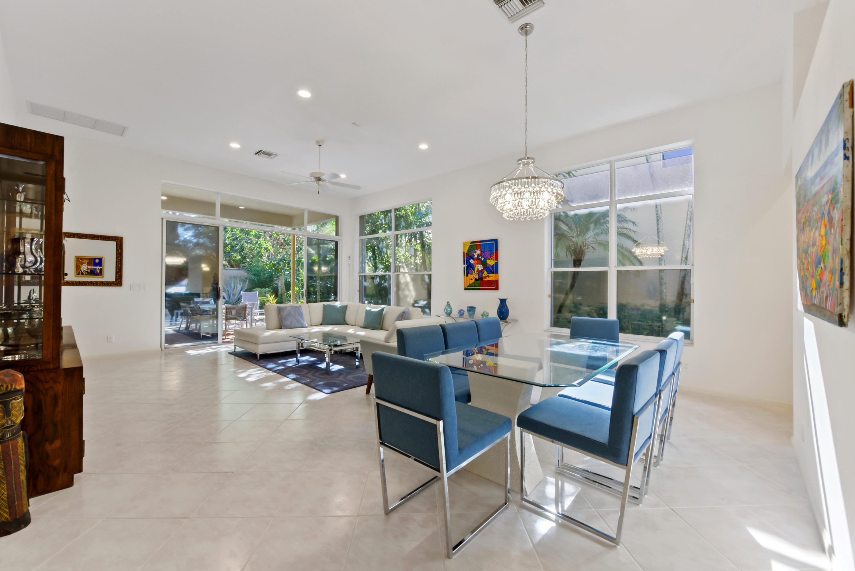 6606 Northwest 23rd Terrace Boca Raton, FL 33496 - Photo 3 of 21 a living room with furniture and a large window