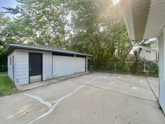 a backyard of a house with lots of green space