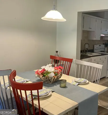 a view of a dining room with furniture