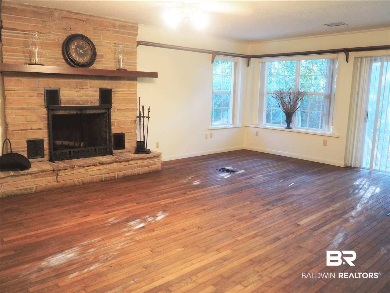 33420 Helms Lane Lillian, AL 36549 - Photo 23 of 35 Family room fireplace