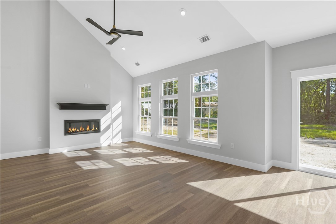 65 Plantation Road Fortson, GA 31808 - Photo 30 of 56 Great room with Vaulted Ceiling and Electric fireplace.
