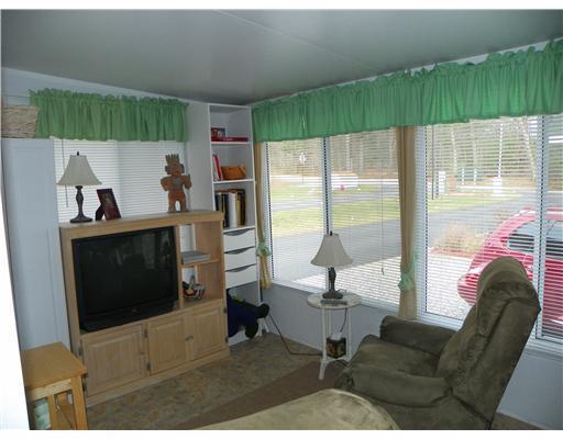 54 Bypass Road, Unit 106 Wells, ME 04090 - Photo 10 of 16 Other. Living room area of the porch.