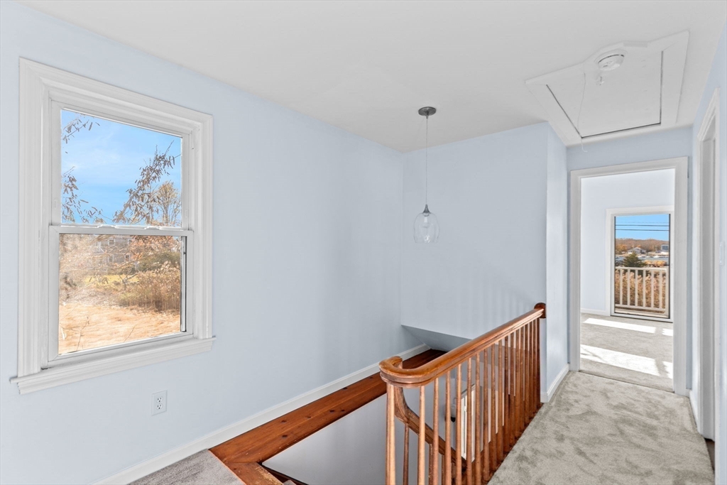 74 Cherry Street Marshfield, MA 02020 - Photo 14 of 35 a view of a hallway with windows