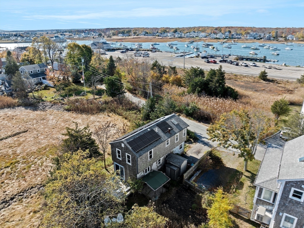 74 Cherry Street Marshfield, MA 02020 - Photo 3 of 35 an aerial view of a house with a yard