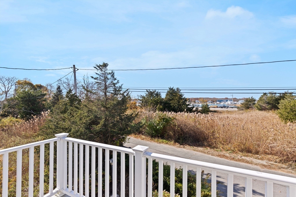 74 Cherry Street Marshfield, MA 02020 - Photo 4 of 35 a view of a yard from balcony