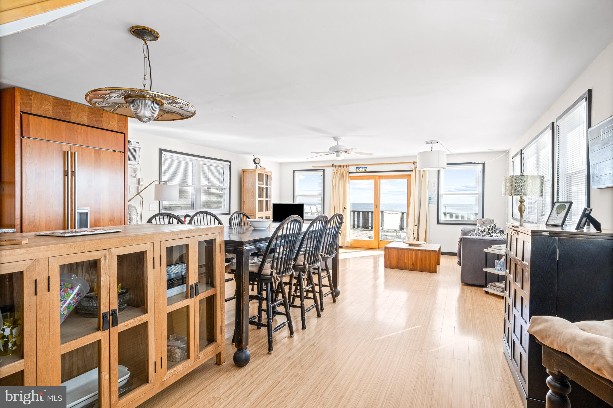 94 Delaware Avenue Fortescue, NJ 08321 - Photo 13 of 31 a view of a dining room with furniture window and wooden floor
