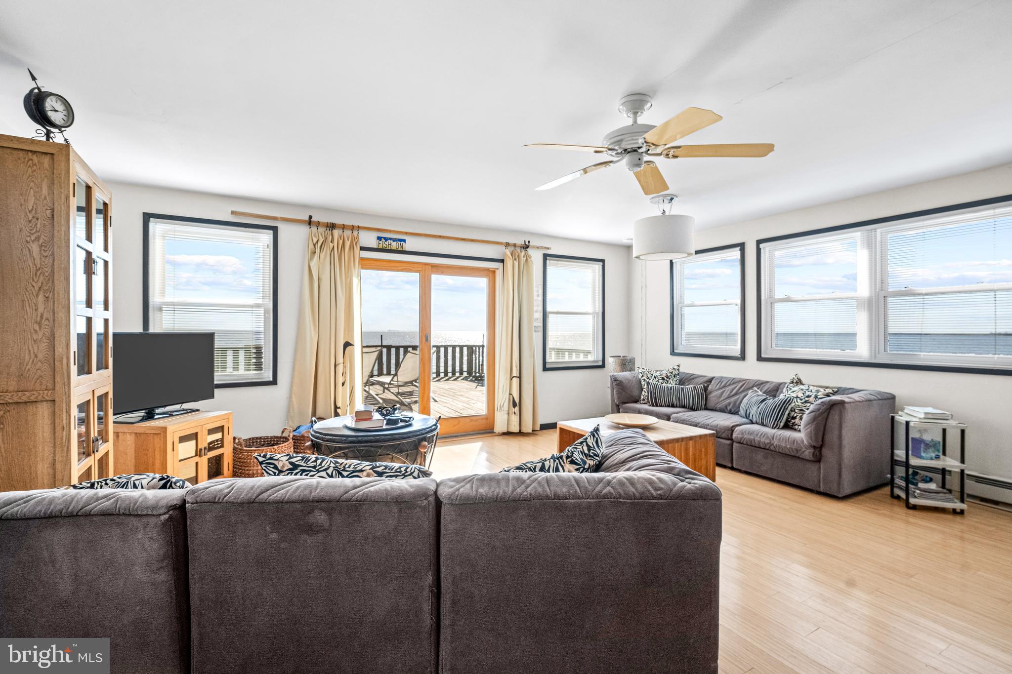 94 Delaware Avenue Fortescue, NJ 08321 - Photo 17 of 31 a living room with furniture and a flat screen tv
