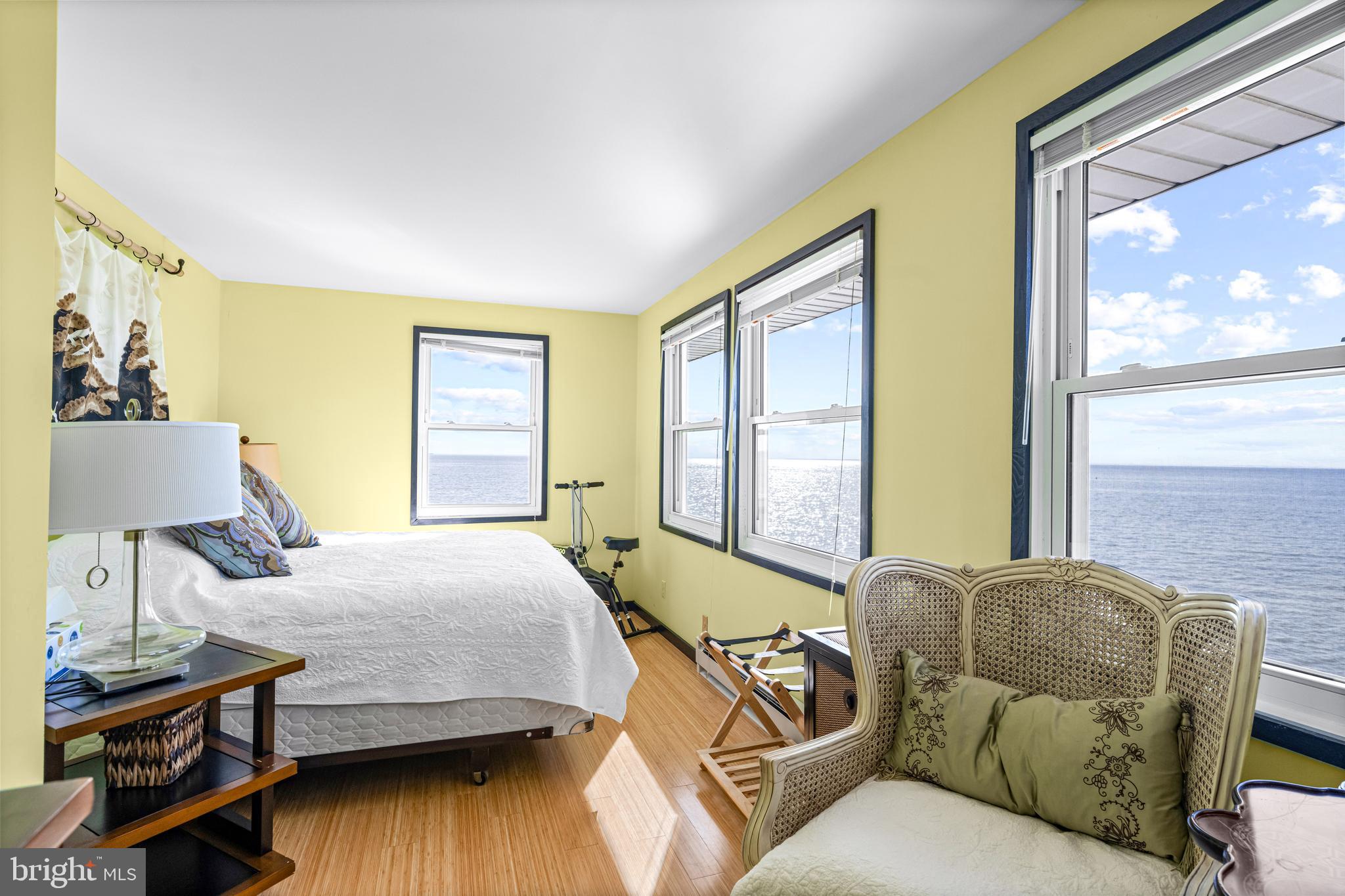 94 Delaware Avenue Fortescue, NJ 08321 - Photo 19 of 31 a bedroom with a bed and wooden floor