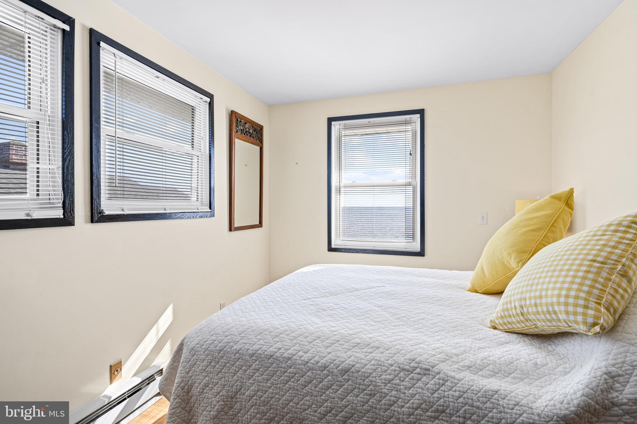 94 Delaware Avenue Fortescue, NJ 08321 - Photo 22 of 31 a bedroom with a bed and a window
