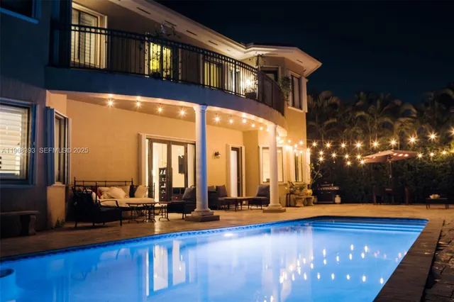 a view of a living room with bathroom