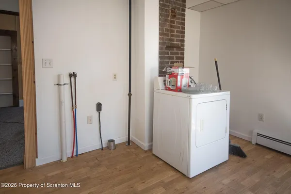 a bathroom with a sink vanity and a mirror