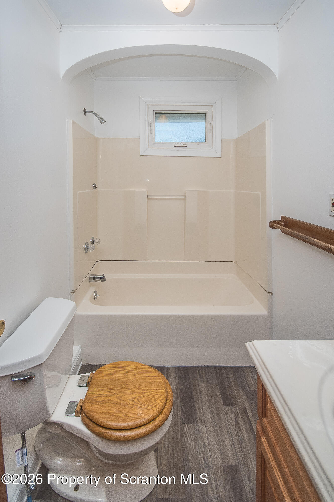 8 Stout Street Pittston, PA 18640 - Photo 14 of 25 a bathroom with a toilet and a bath tub
