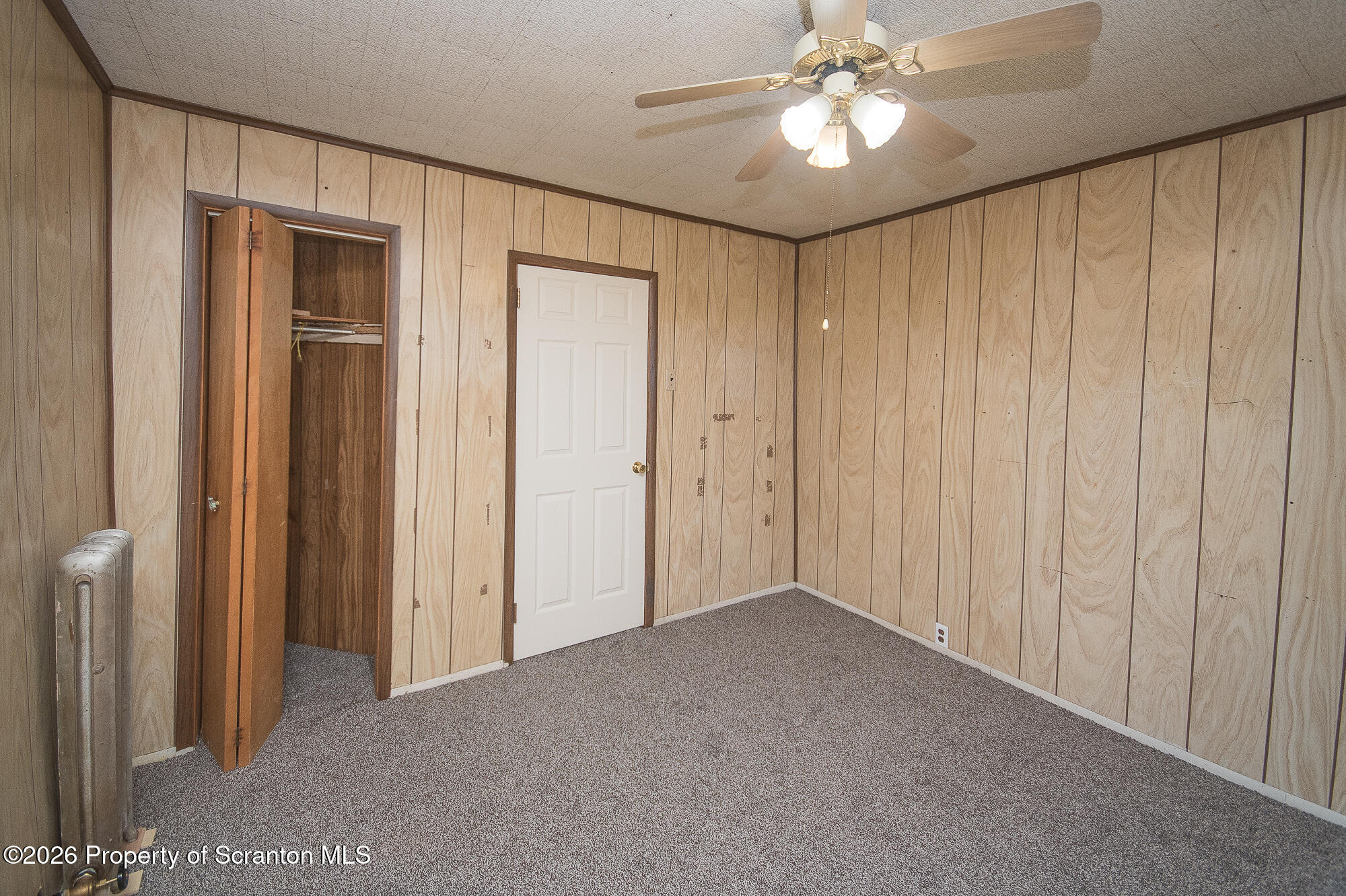8 Stout Street Pittston, PA 18640 - Photo 19 of 25 a view of an empty room with a ceiling fan
